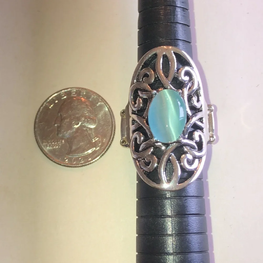 Silver Tone Filigree Ring with Aqua Blue Moon Glow Faux Stone